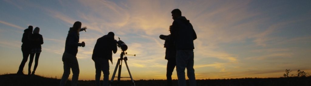 observing the planets through telescope