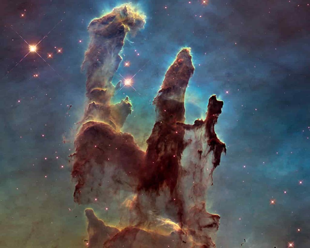 This image of the pillars of creation contains multiple colors, including: Midnight Blue, Dark Olive Green, Darl Slate Grey. Tan, Gray.