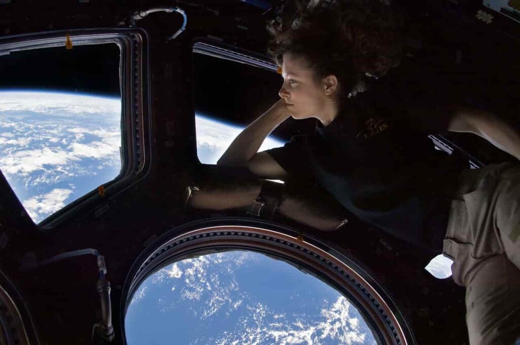 astronaut looking out of the cupola