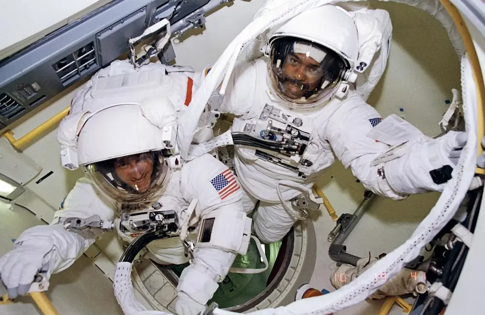 astronauts wearing EVA spacesuits