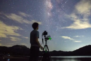 astrophotographer taking pictures of the nightsky