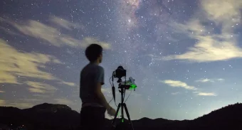 astrophotographer taking pictures of the nightsky